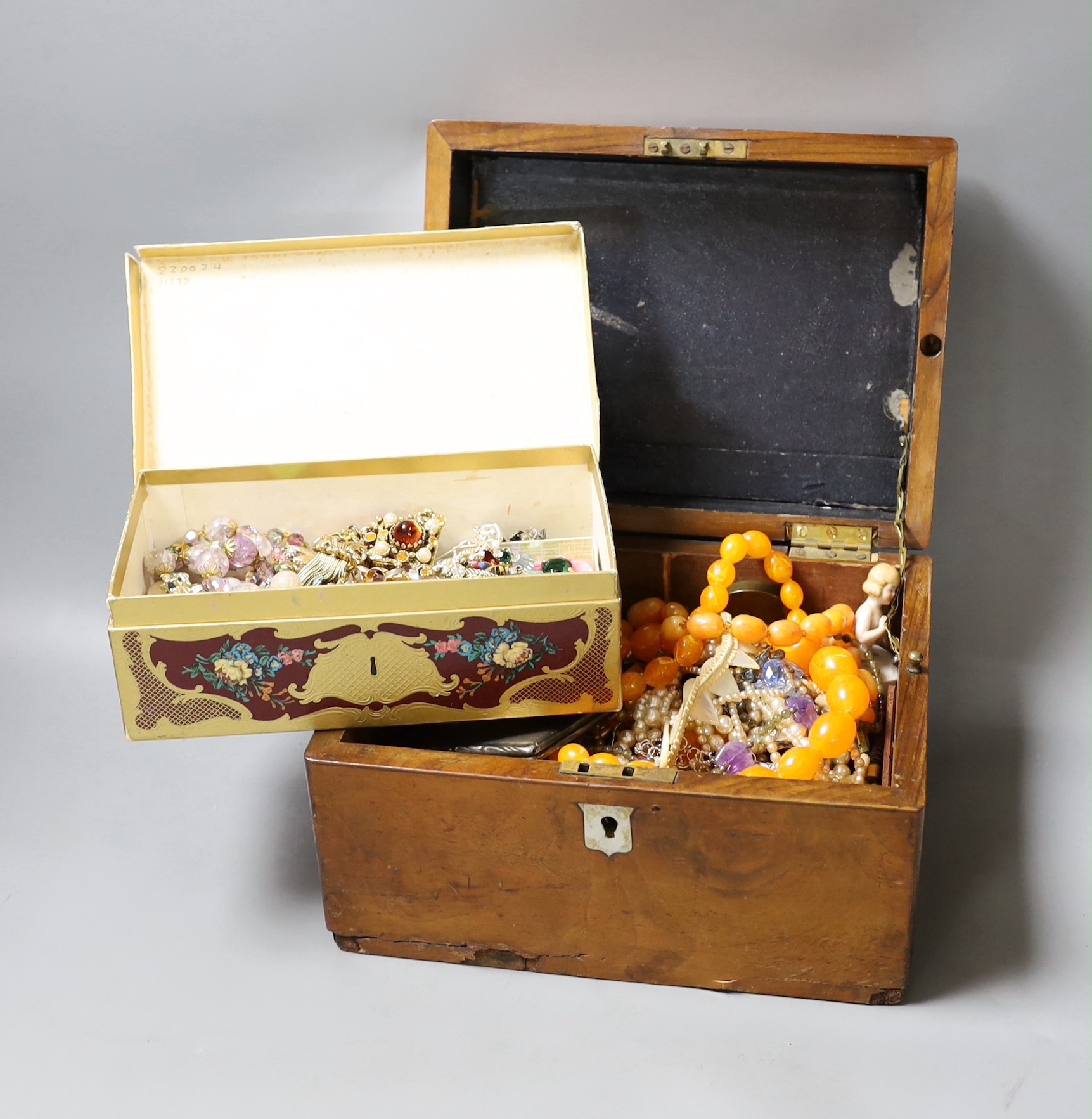 A large quantity of mixed costume jewellery in two boxes.